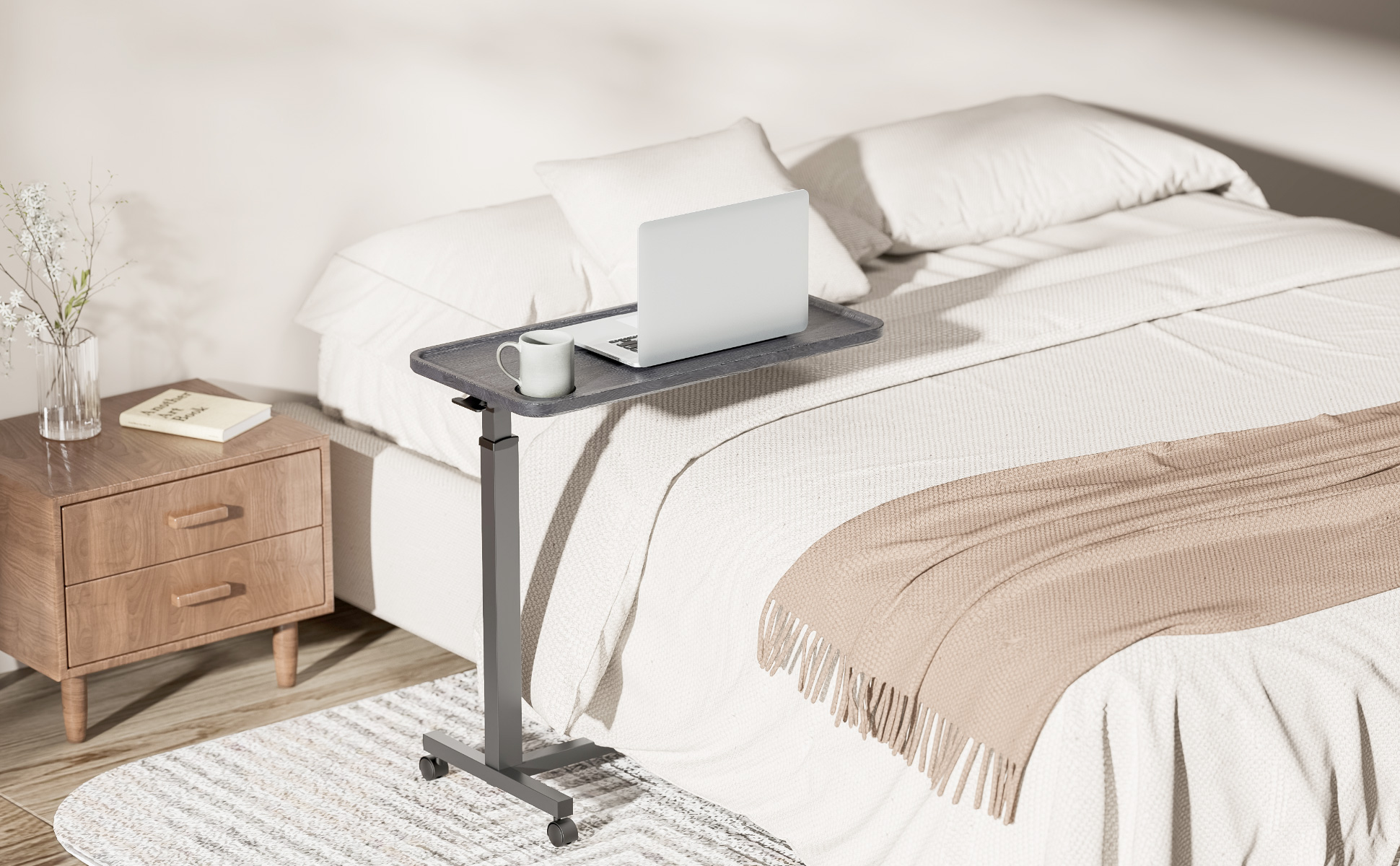 Aura Lite Spring Assisted Height Adjustable Over-bed Table in Black home scene