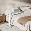 Aura Lite Spring Assisted Height Adjustable Over-bed Table in White home scene