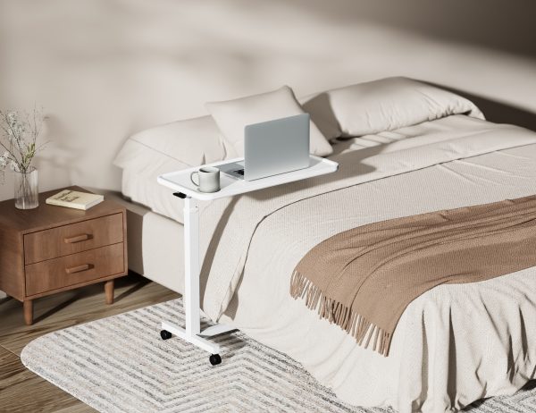 Aura Lite Spring Assisted Height Adjustable Over-bed Table in White home scene