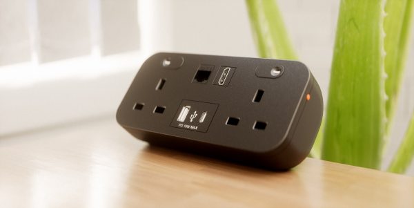 Hicon two dual UK socket desktop power unit with dual USB black and Media outputs FRONT WHITE LIFESTYLE IMAGE